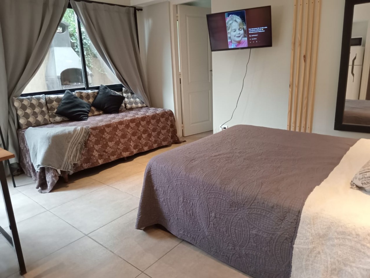 DEPARTAMENTO CON PATIO , EDIFICIO FRENTE AL MAR 