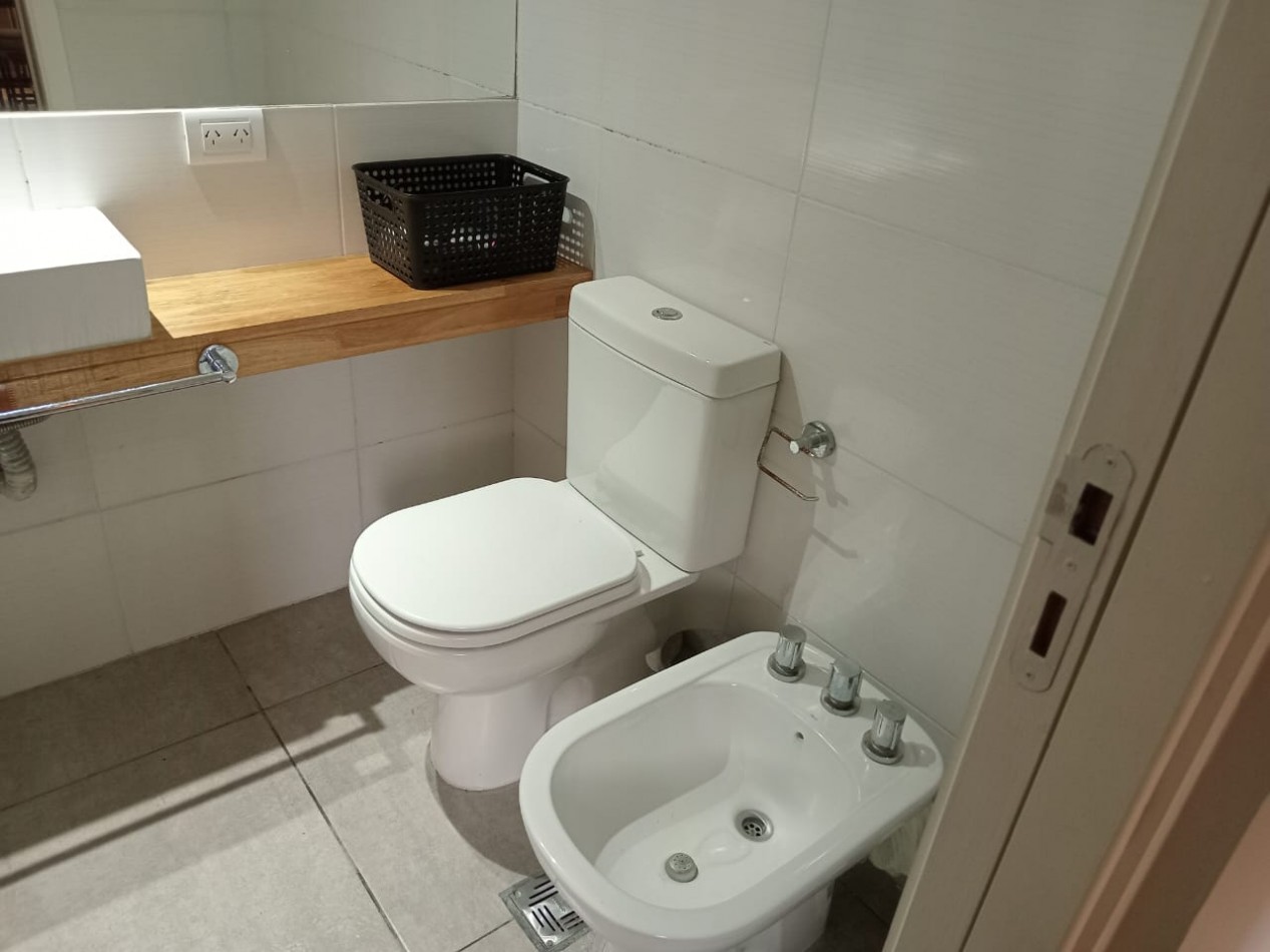 DEPARTAMENTO CON PATIO , EDIFICIO FRENTE AL MAR 