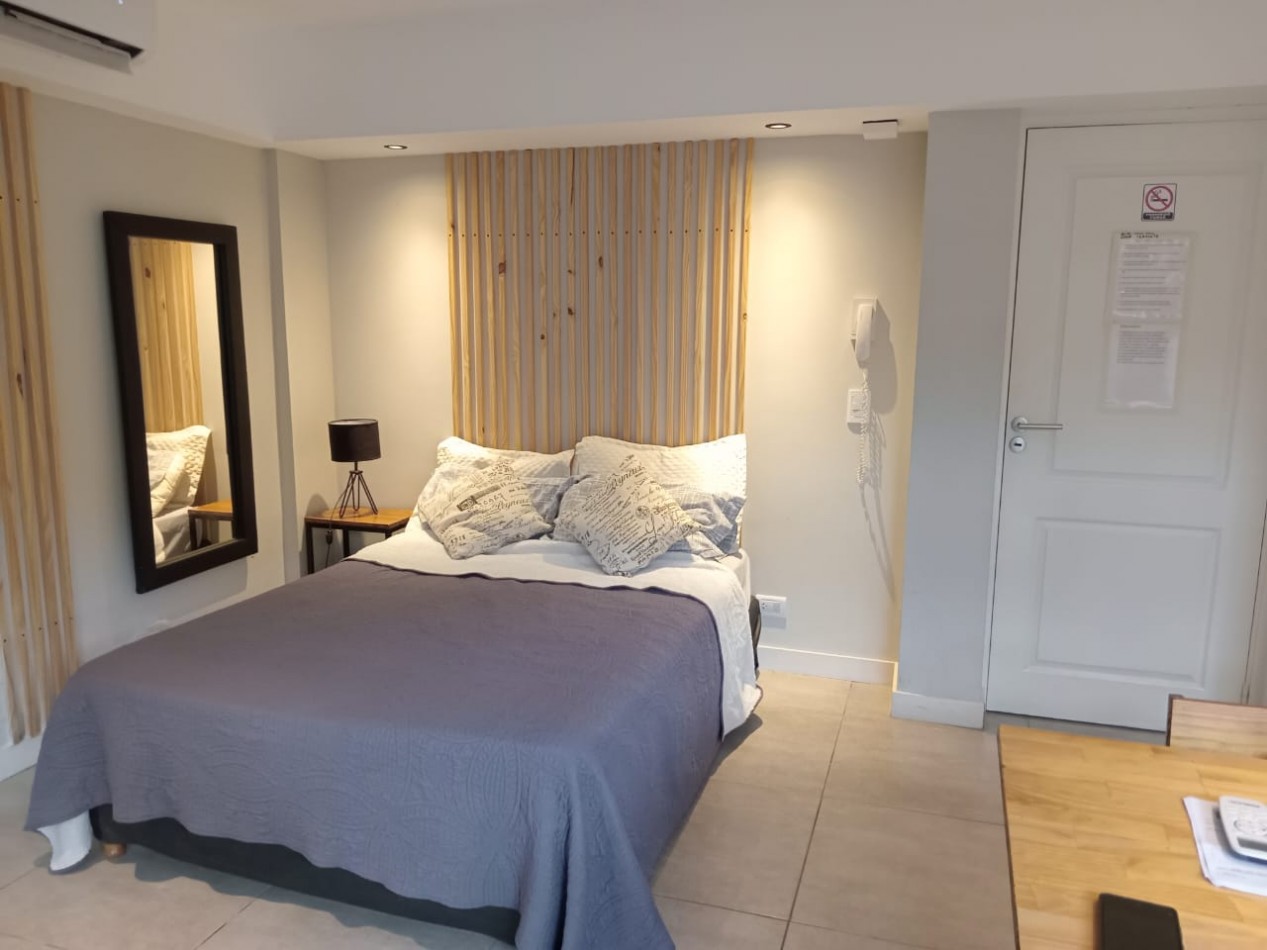 DEPARTAMENTO CON PATIO , EDIFICIO FRENTE AL MAR 