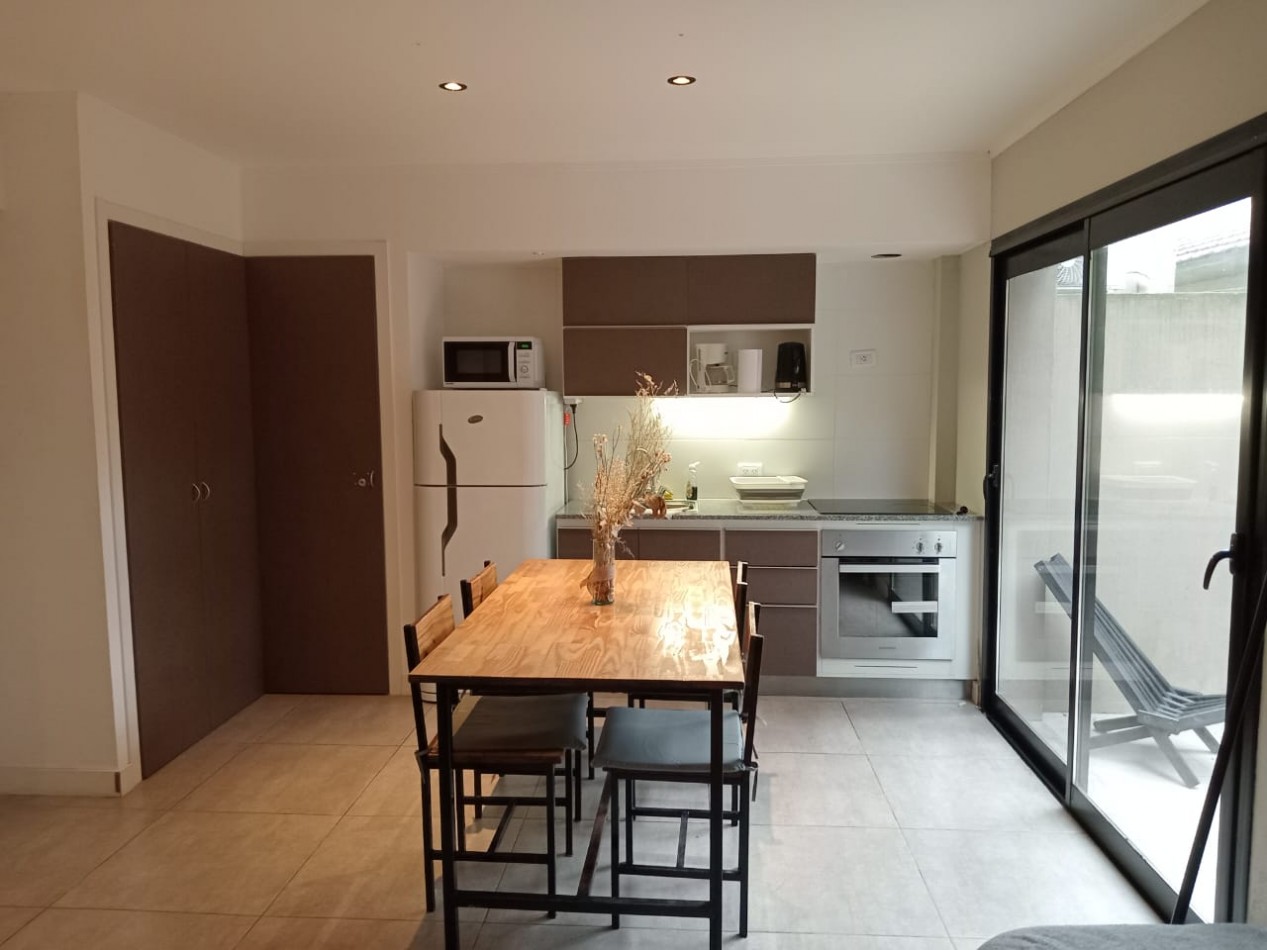 DEPARTAMENTO CON PATIO , EDIFICIO FRENTE AL MAR 