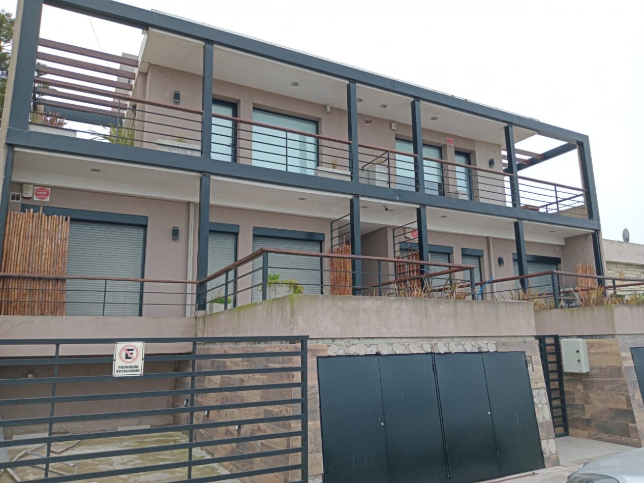 DEPARTAMENTO CON PATIO , EDIFICIO FRENTE AL MAR 