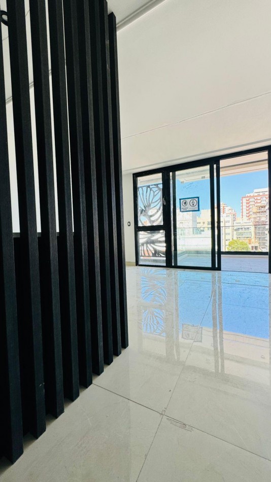 DEPARTAMENTO A ESTRENAR 3 AMBIENTES CON COCHERA Y BAULERA . ENTREGA FEBRERO 2026-PLAYA GRANDE 