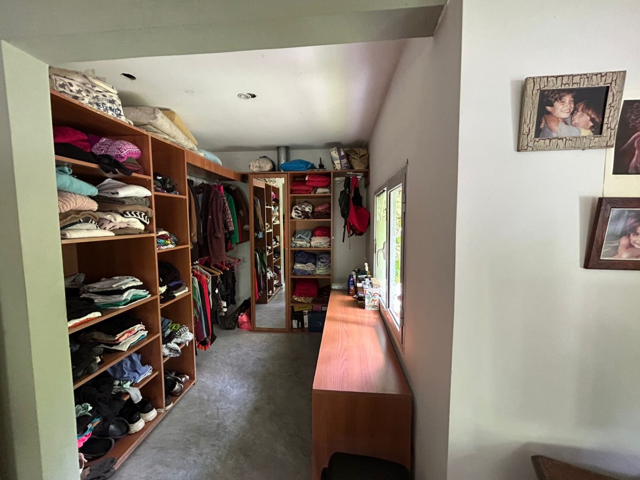 CASA EN PH TOTALMENTE INDEPENDIENTE 4 AMBIENTES CON ESCRITORIO QUINCHO CUBIERTO Y PARQUE .APTO CREDITO