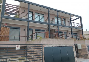 DEPARTAMENTO CON PATIO , EDIFICIO FRENTE AL MAR 